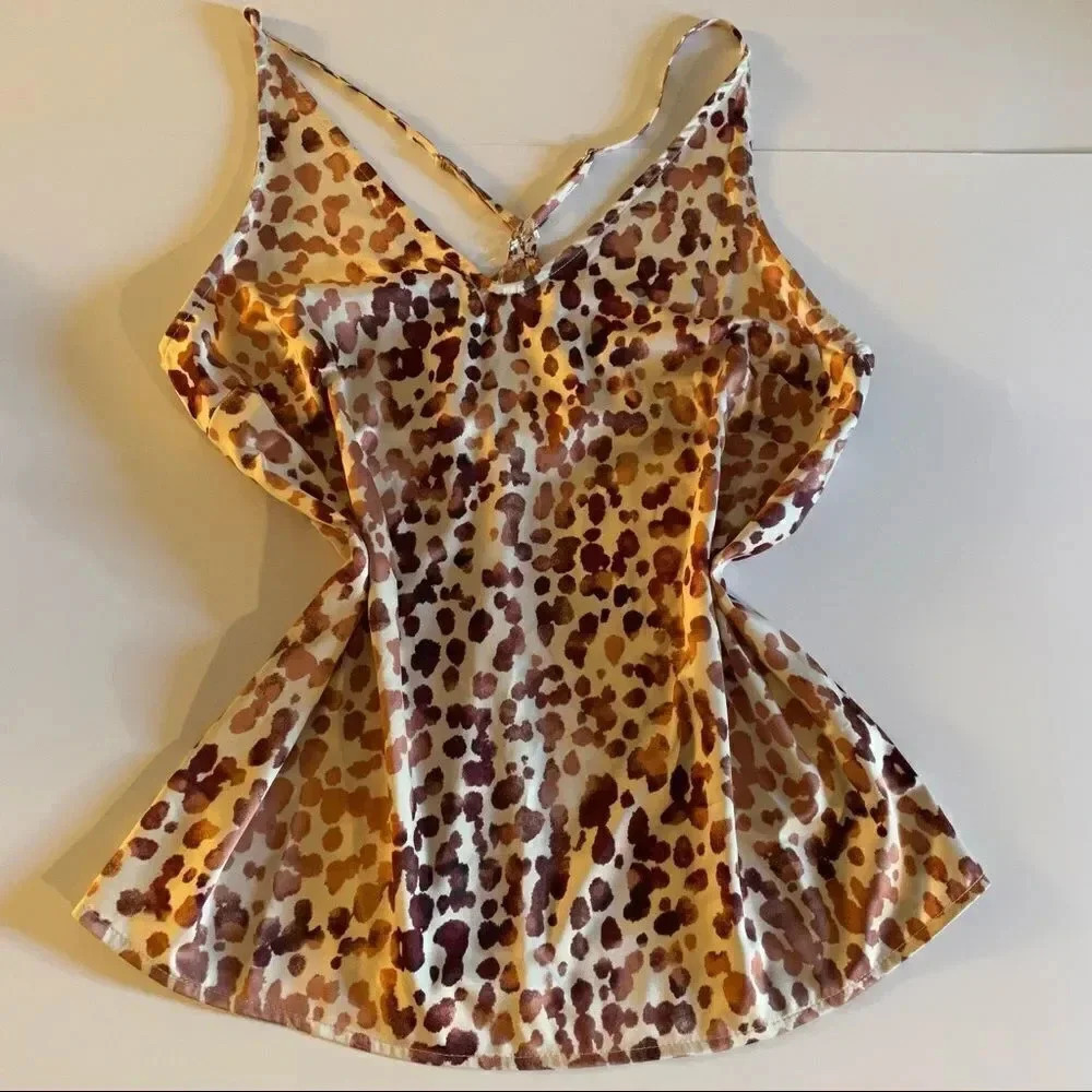 Stars above leopard print tank size S